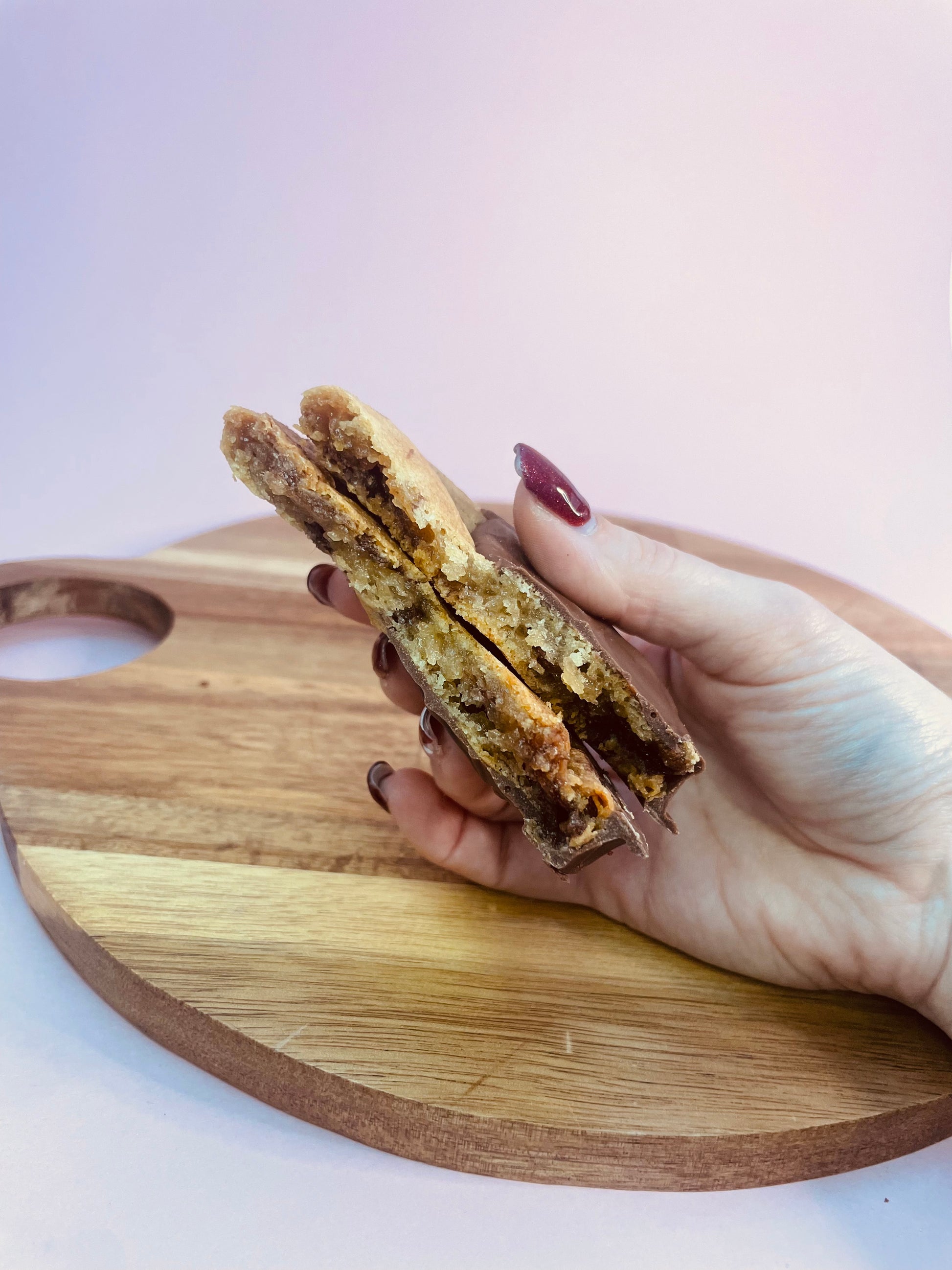 Gluten free and vegan chocolate dipped choc chip cookie image 2
